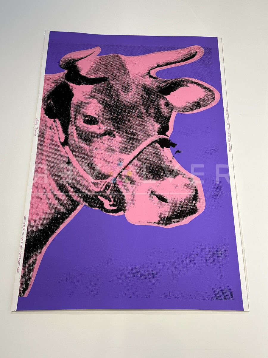 Cow12A by Andy Warhol outside of a frame