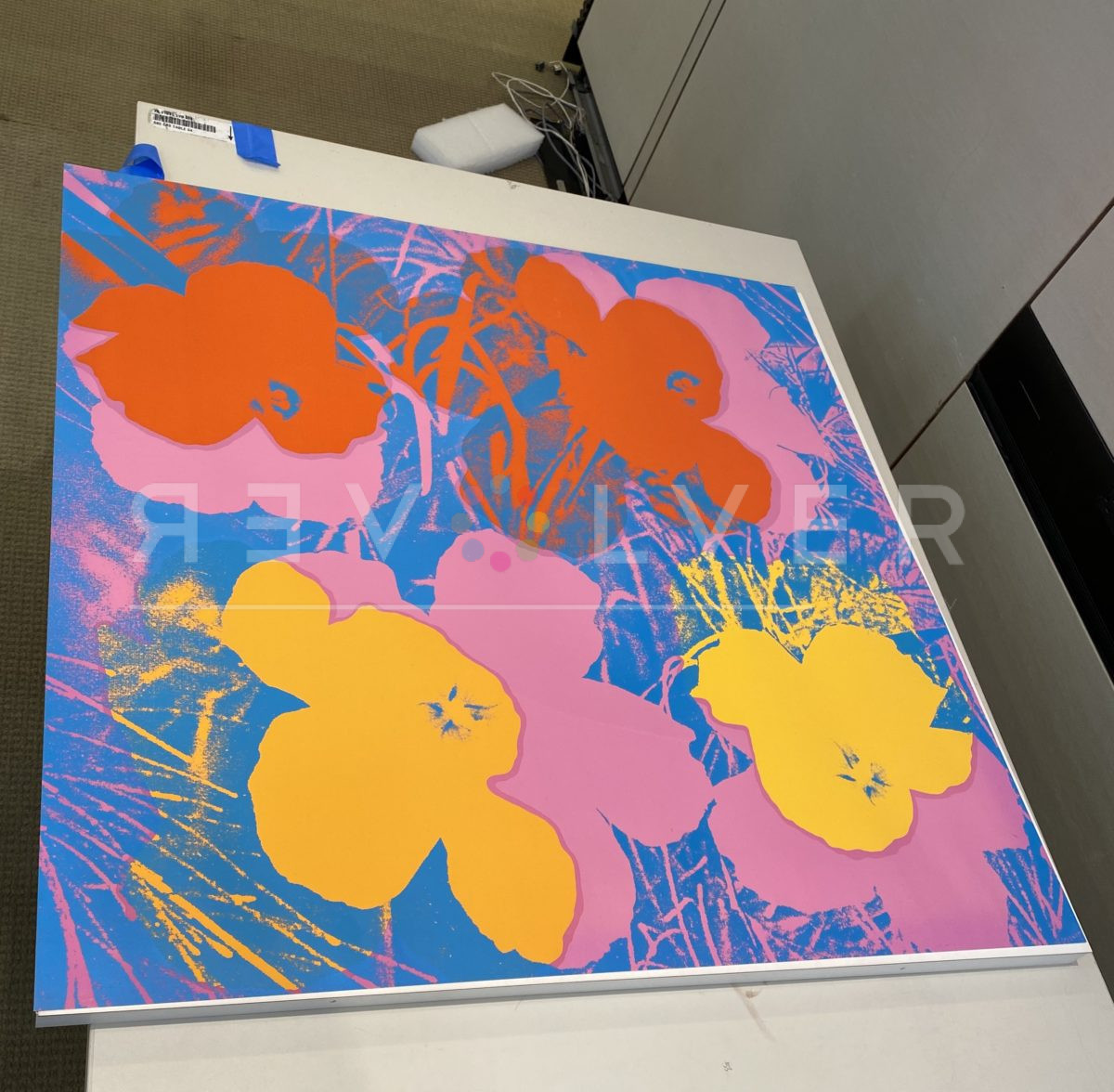 Andy Warhol's Flowers 66 print out of the frame