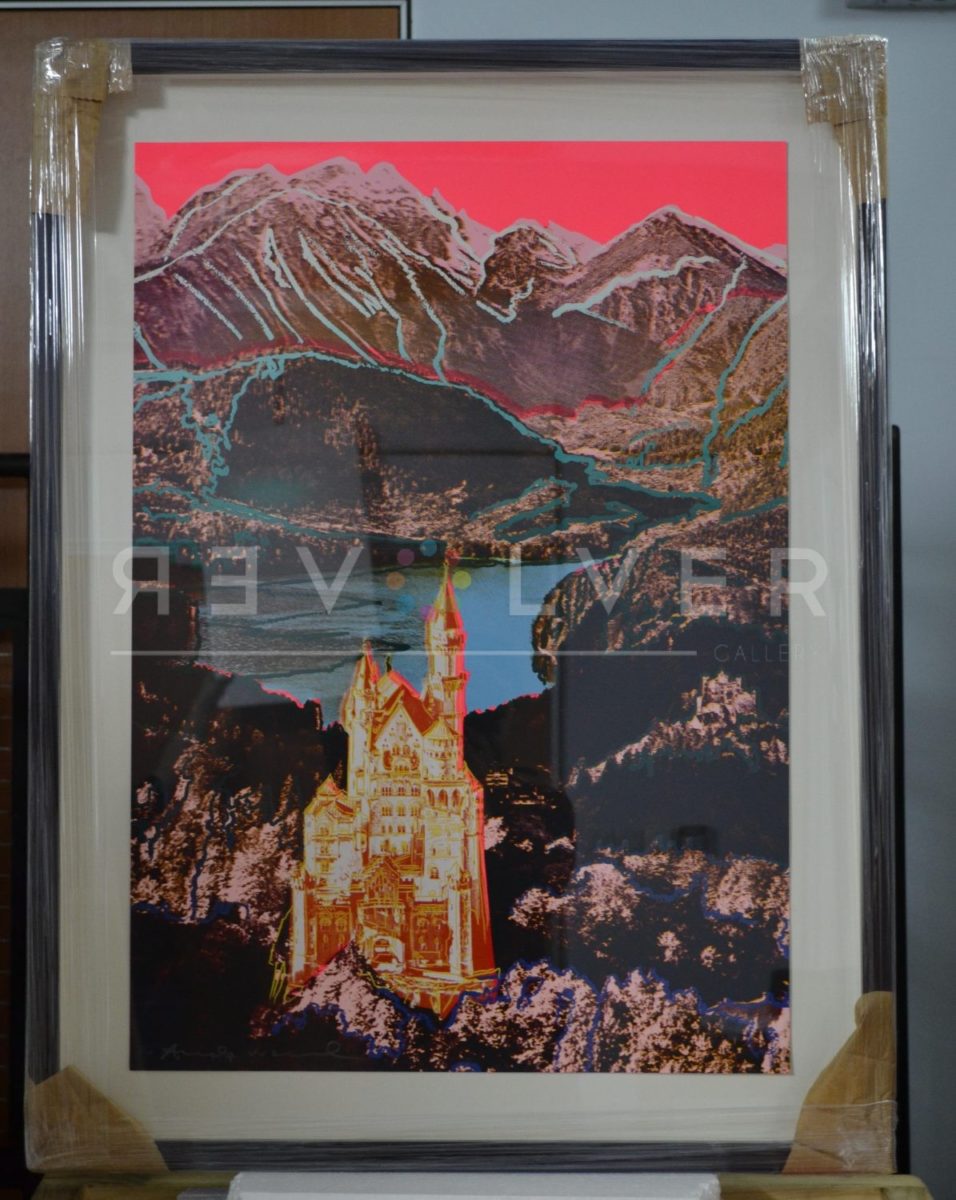 Andy Warhol Neuschwanstein 372 screenprint in frame, showing a castle nestled in the mountains in Pop Art style.