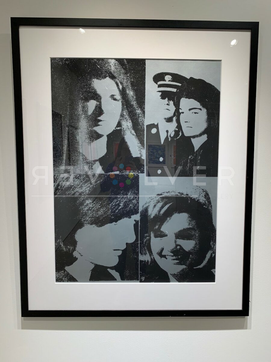 Jackie III by Andy Warhol in frame on the wall.