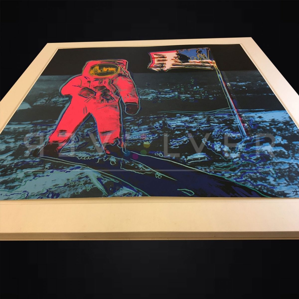 Andy Warhol Moonwalk 405 canvas laying on a table. Stock photo with Revolver Gallery watermark.