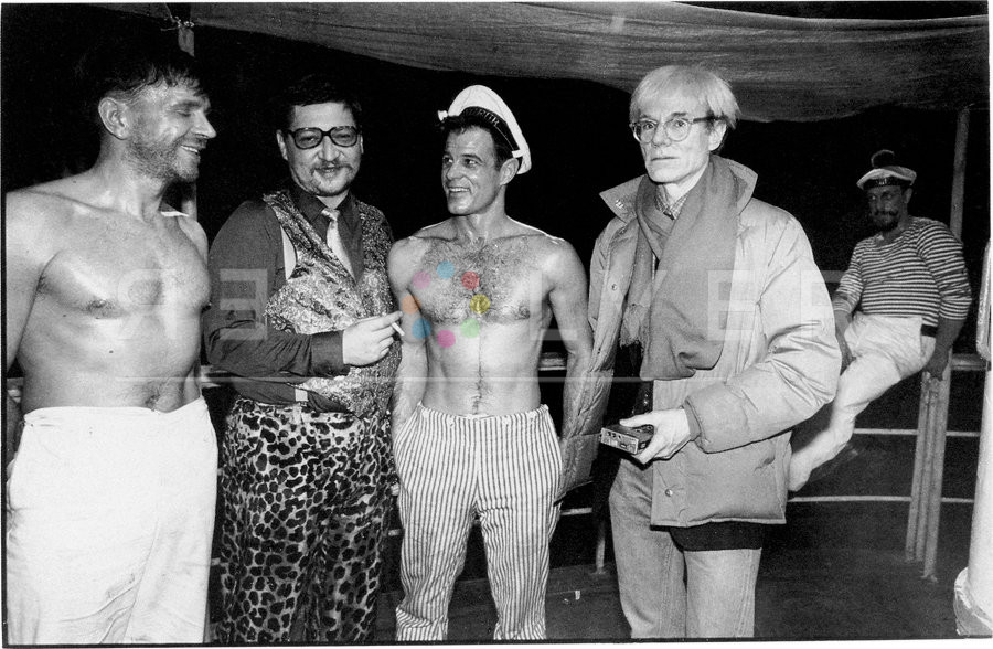Rainer Werner Fassbinder, Brad Davis, and Andy Warhol on the set of Querelle, 1982.