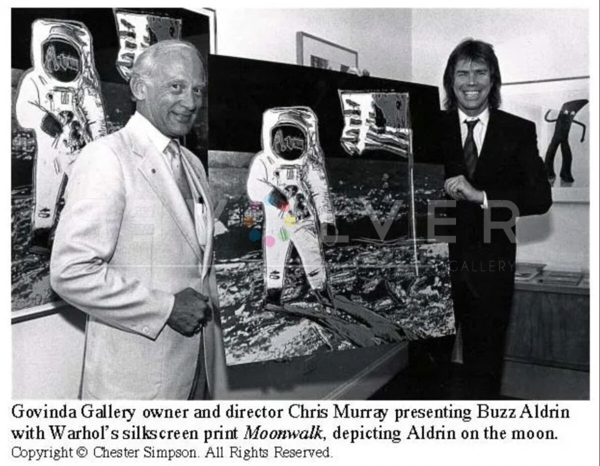 Chris Murray presenting Buzz Aldrin with one of Andy Warhol's Moonwalk screen prints.