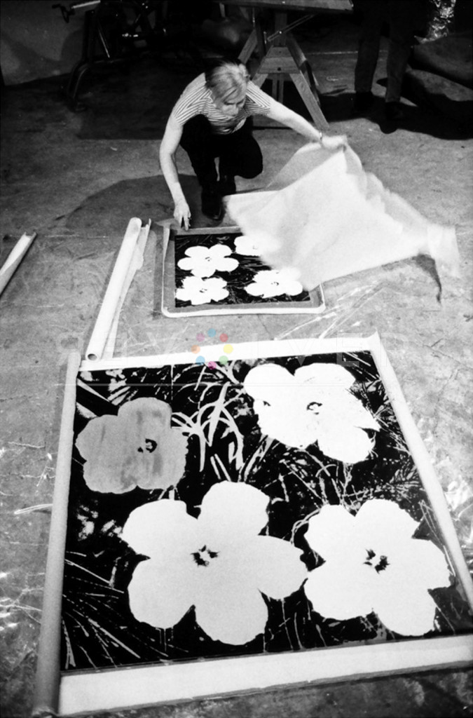 Andy Warhol working on the Flowers screenprints at the Factory.