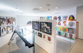 Revolver Gallery inside, upstairs, Mick Jagger, Dollar Signs, Shoes, Marilyn, Mao, and Cowboys on gallery wall.