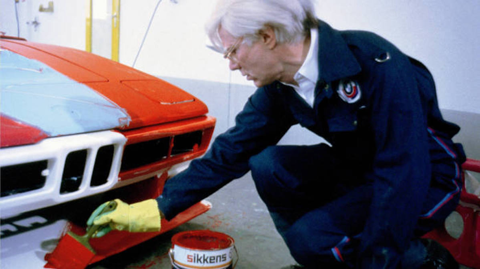Picture of Andy Warhol painting his BMW Art Car.