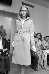 A model wearing Halston's iconic suede shirtdress.
