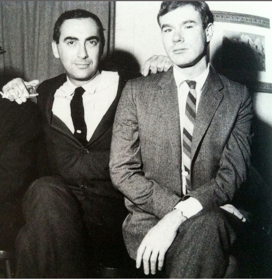 Nathan Gluck, one of Warhol's early assistants, sitting with Warhol.