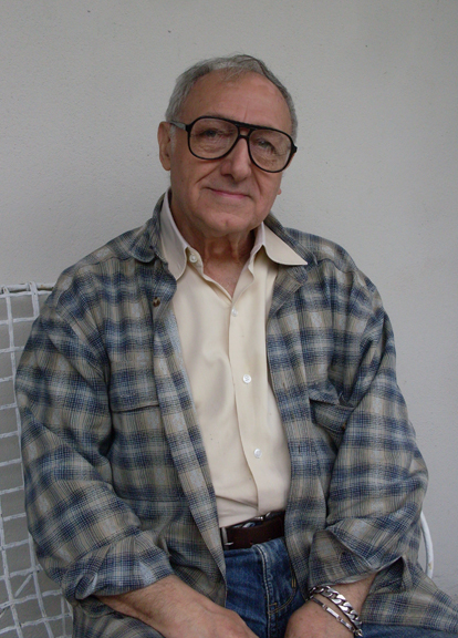 Portrait photograph of gallerist Vito Giallo, who hosted some of Warhol's earliest shows in New York City.