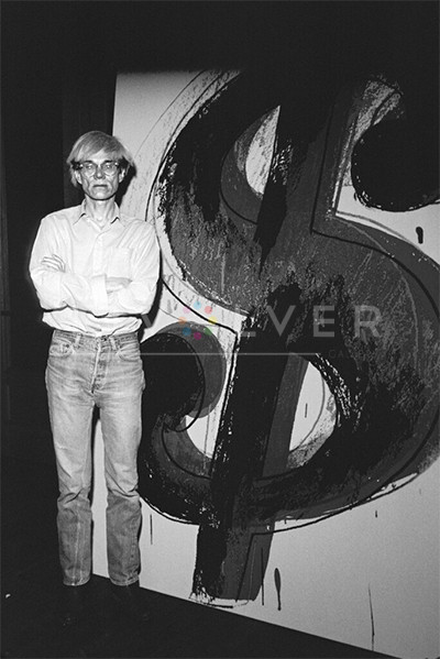 Andy Warhol with Dollar Sign painting