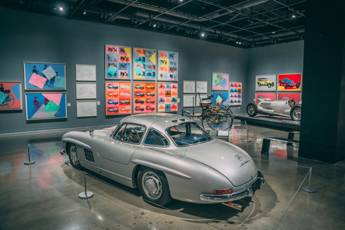 Part of the gallery at the Andy Warhol: CARS exhibit at the Petersen