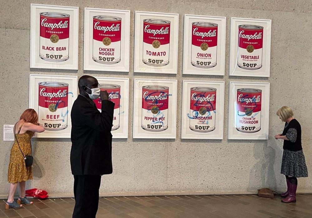 Warhol's Campbell's Soup prints vandalized at the national gallery of Australia.