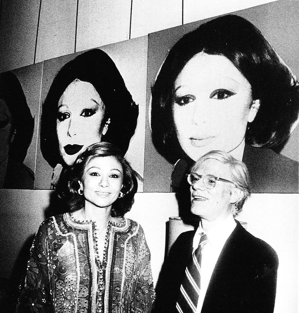 Shahbanou Farah Pahlavi and Warhol in front of her portrait.Photo by Alain Nogues/Sygma. Getty Images.
