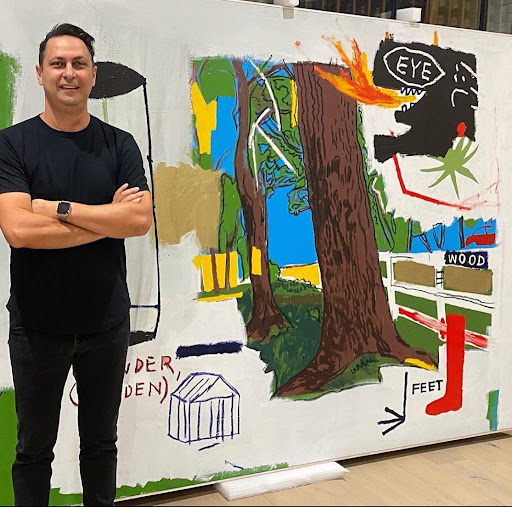 Revolver Gallery founder and owner Ron Rivlin with Wood by Jean-Michel Basquiat and Andy Warhol, 2020.