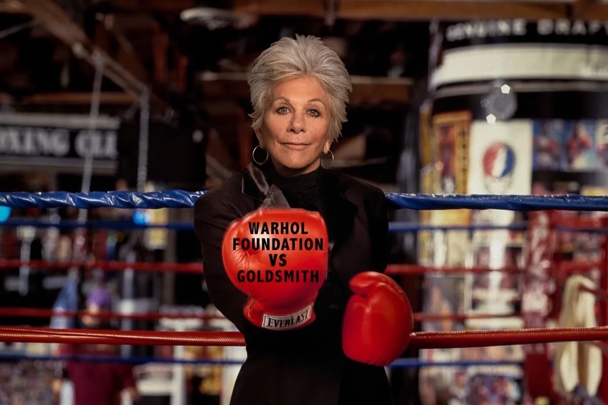 Lynn Goldsmith GoFundMe campaign image. She is wearing boxing gloves.
