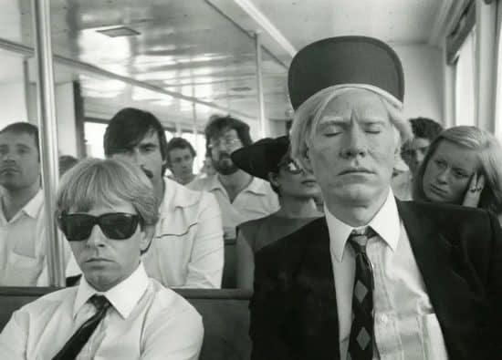 Rupert Jasen Smith and Andy Warhol on a Ferry to Fire Island. By Bob Colacello, 1979.