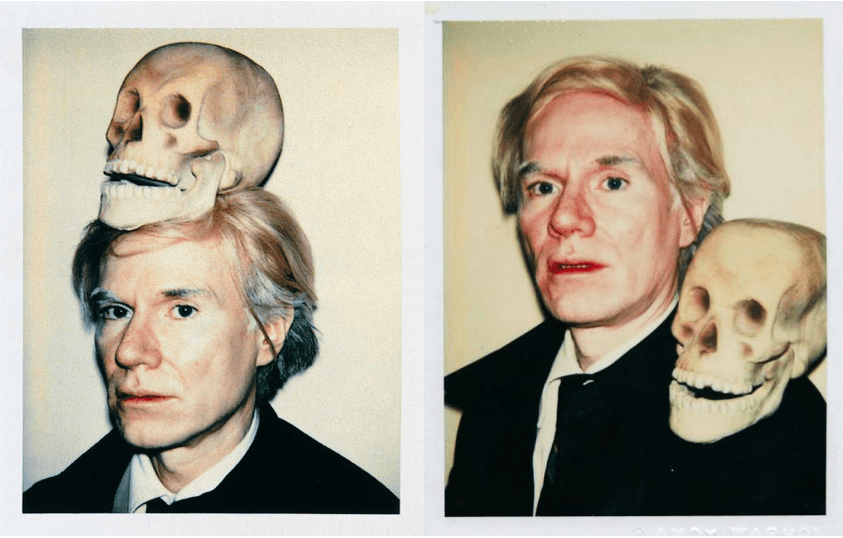 Andy Warhol with a Skull on top of his head.